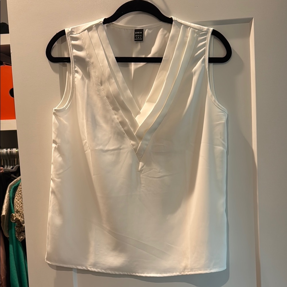 White Sleeveless Blouse